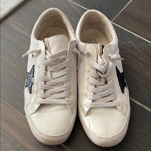 White Sneakers with Black Star Accent